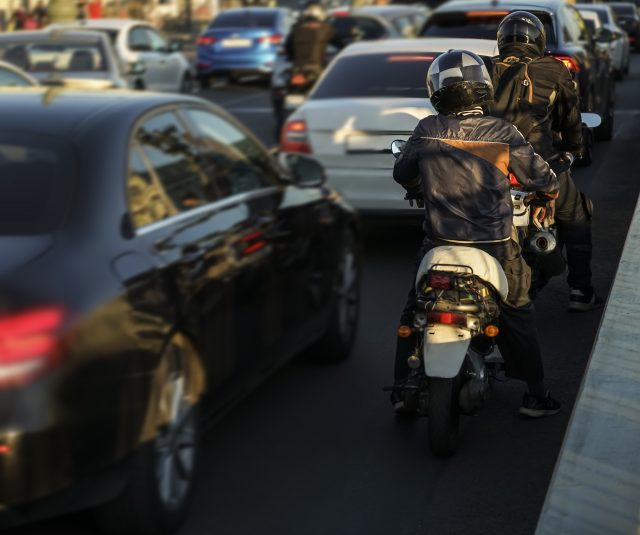 Traffic jams, a stream of cars. Rush hour, cars go out of town A